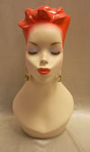 Lucy Red Hair Mannequin Head Eyes Closed and Pierced Ears