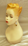 Lucy Golden Hair Mannequin Head Eyes Closed and Pierced Ears